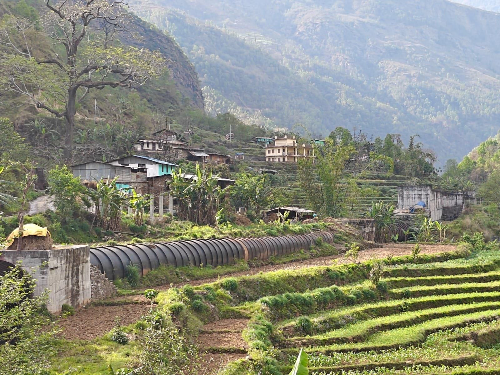Steel pipeline crossing the terraced fields